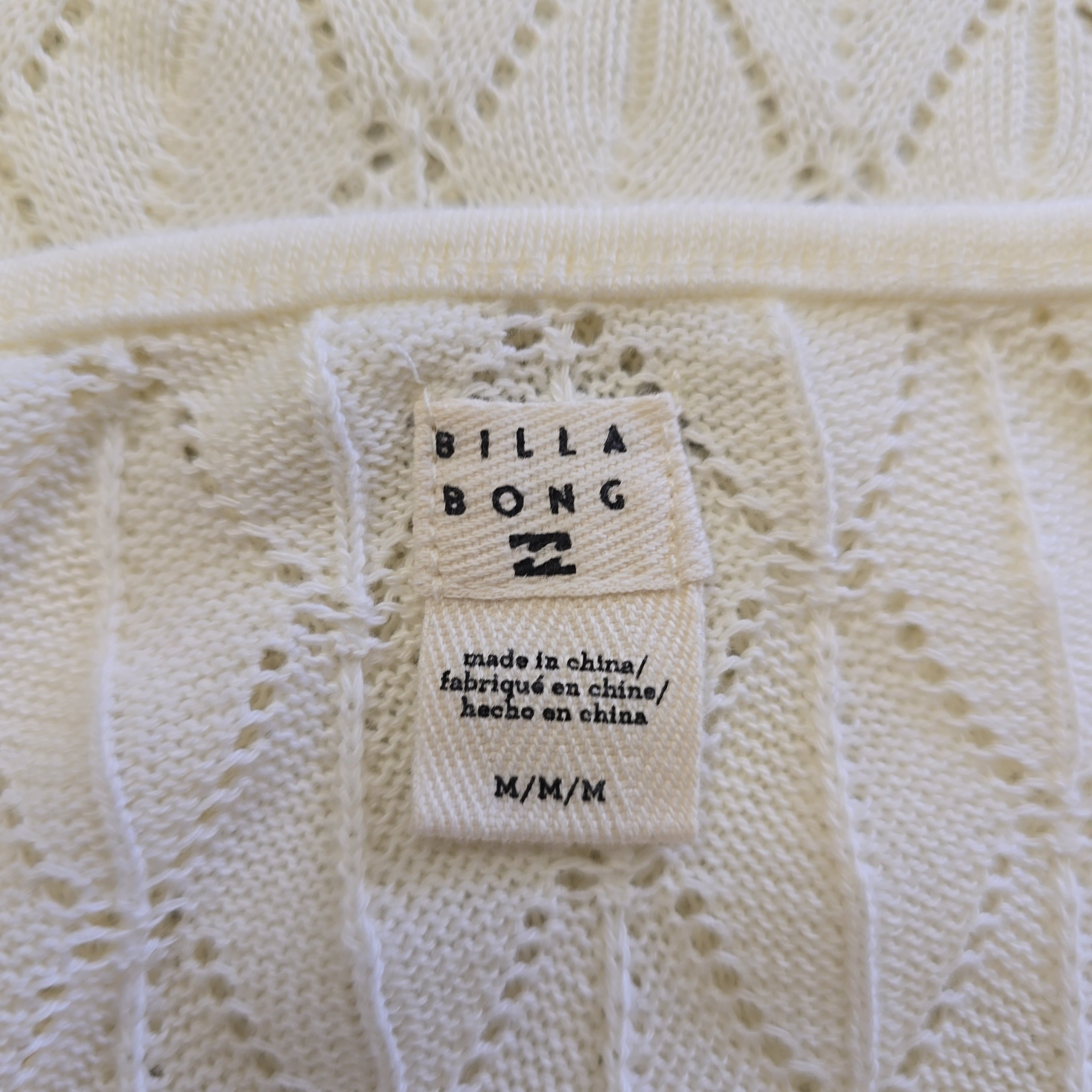 Close-up of a textured fabric with a Billa Bong label.