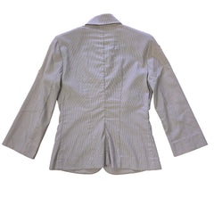 Light gray jacket on a tiled floor