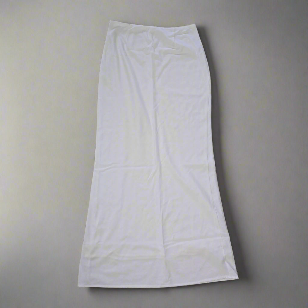 White skirt on a gray background