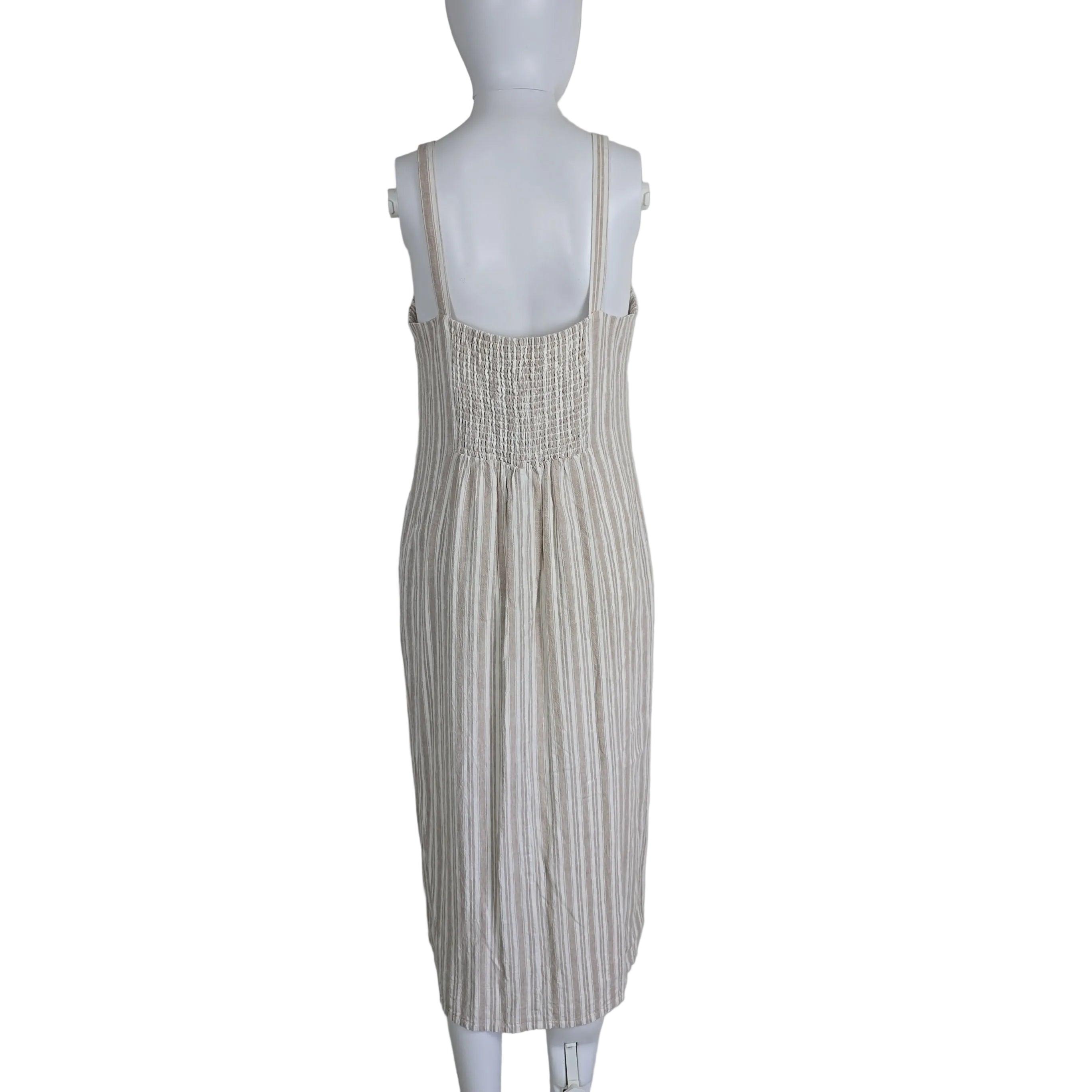 Striped dress with button details on a light background