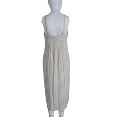 Striped dress with button details on a light background