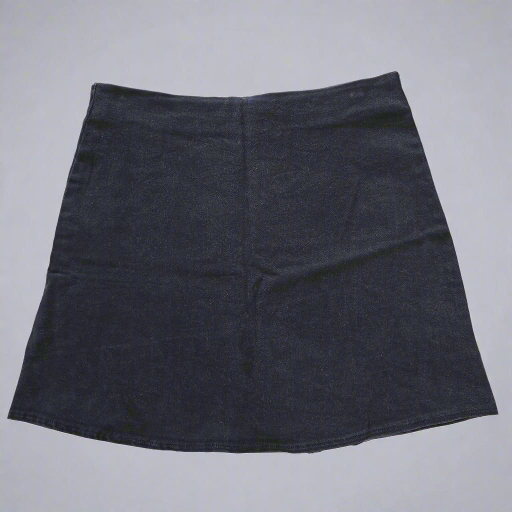 Black skirt on a tiled floor