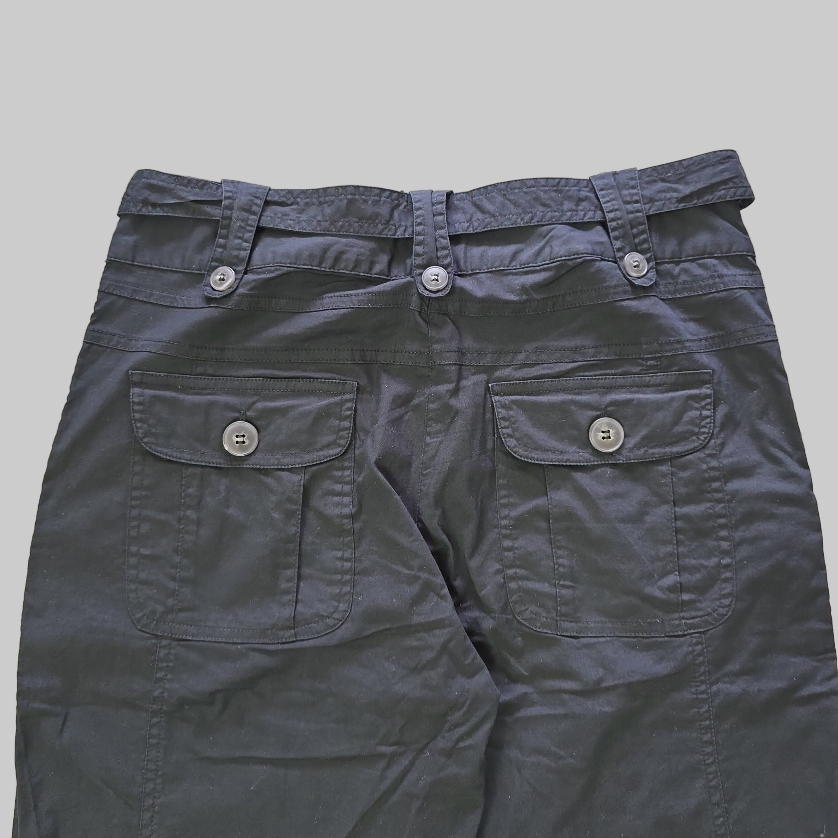 Pair of black pants on a light background