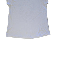 White t-shirt with floral design and text on a light background