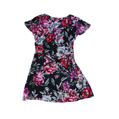 Floral-patterned mini dress on a light background