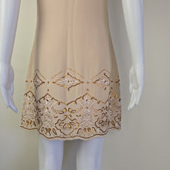 Beige dress on a light background