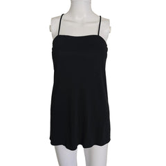 Black sleeveless top on a mannequin against a beige background