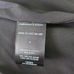 Clothing label on a dark fabric background