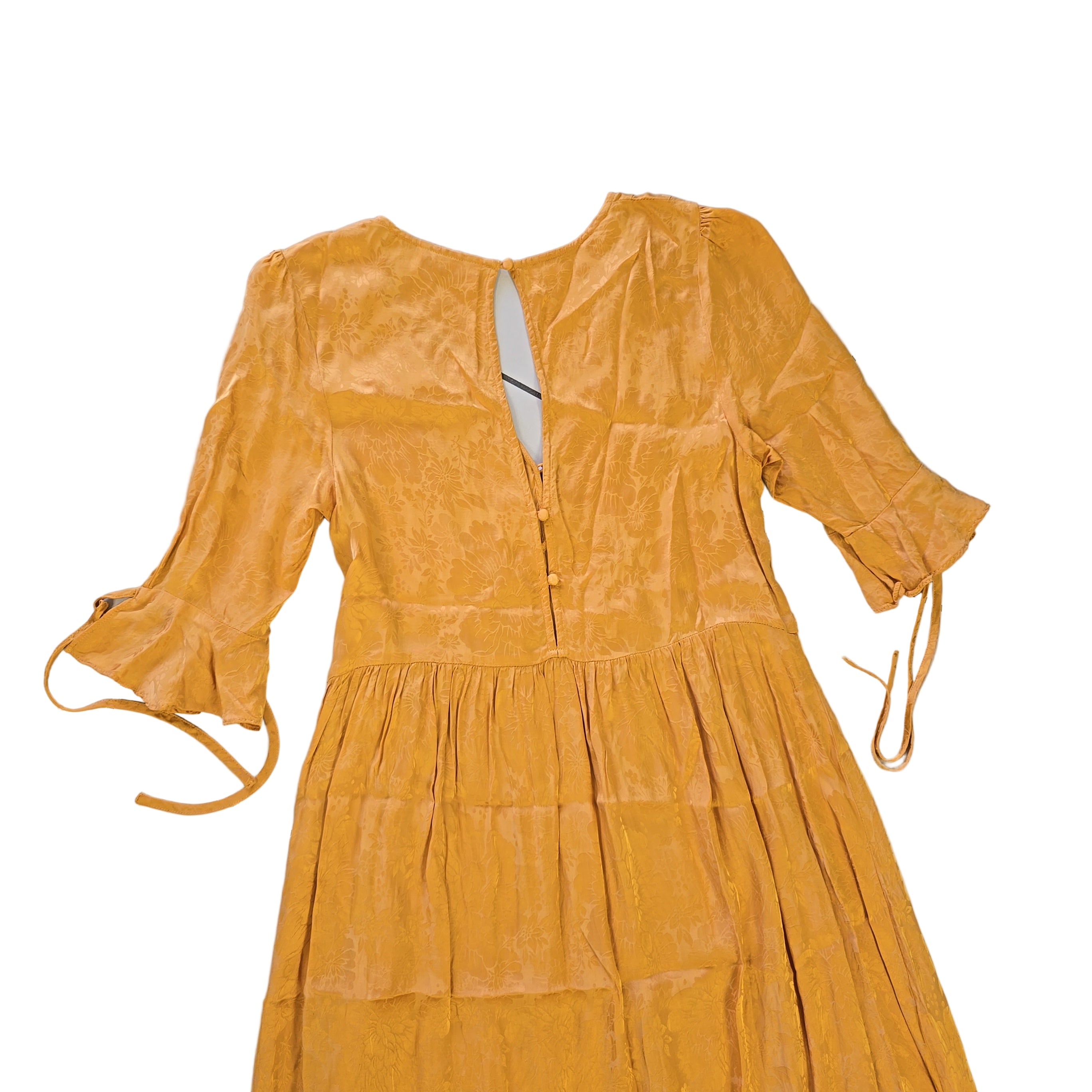 Yellow dress on a light background