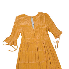 Yellow dress on a light background