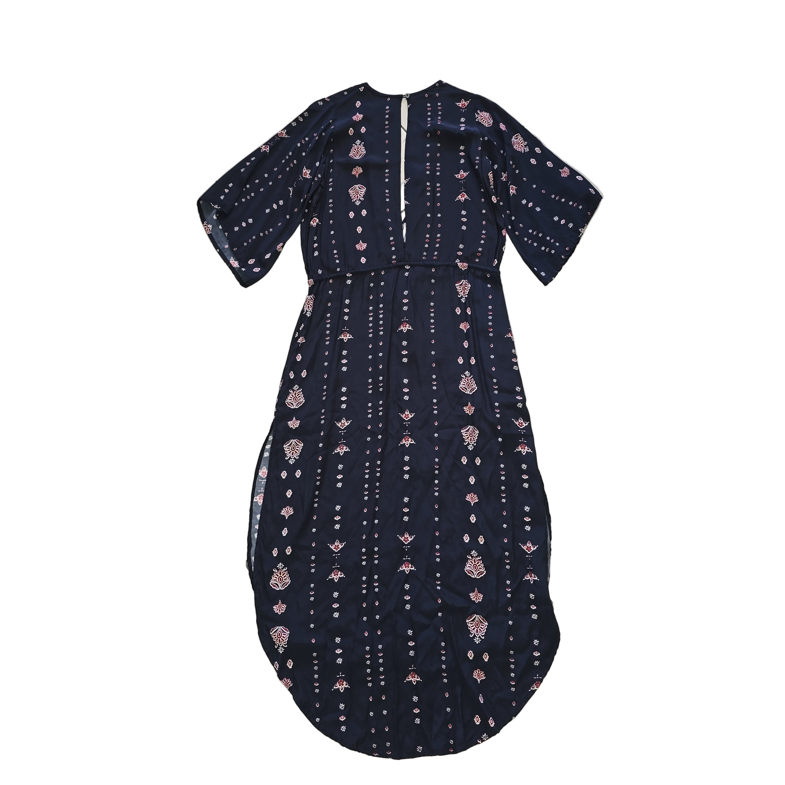 Black dress with white and pink patterns on a light background