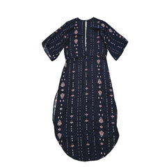 Black dress with white and pink patterns on a light background