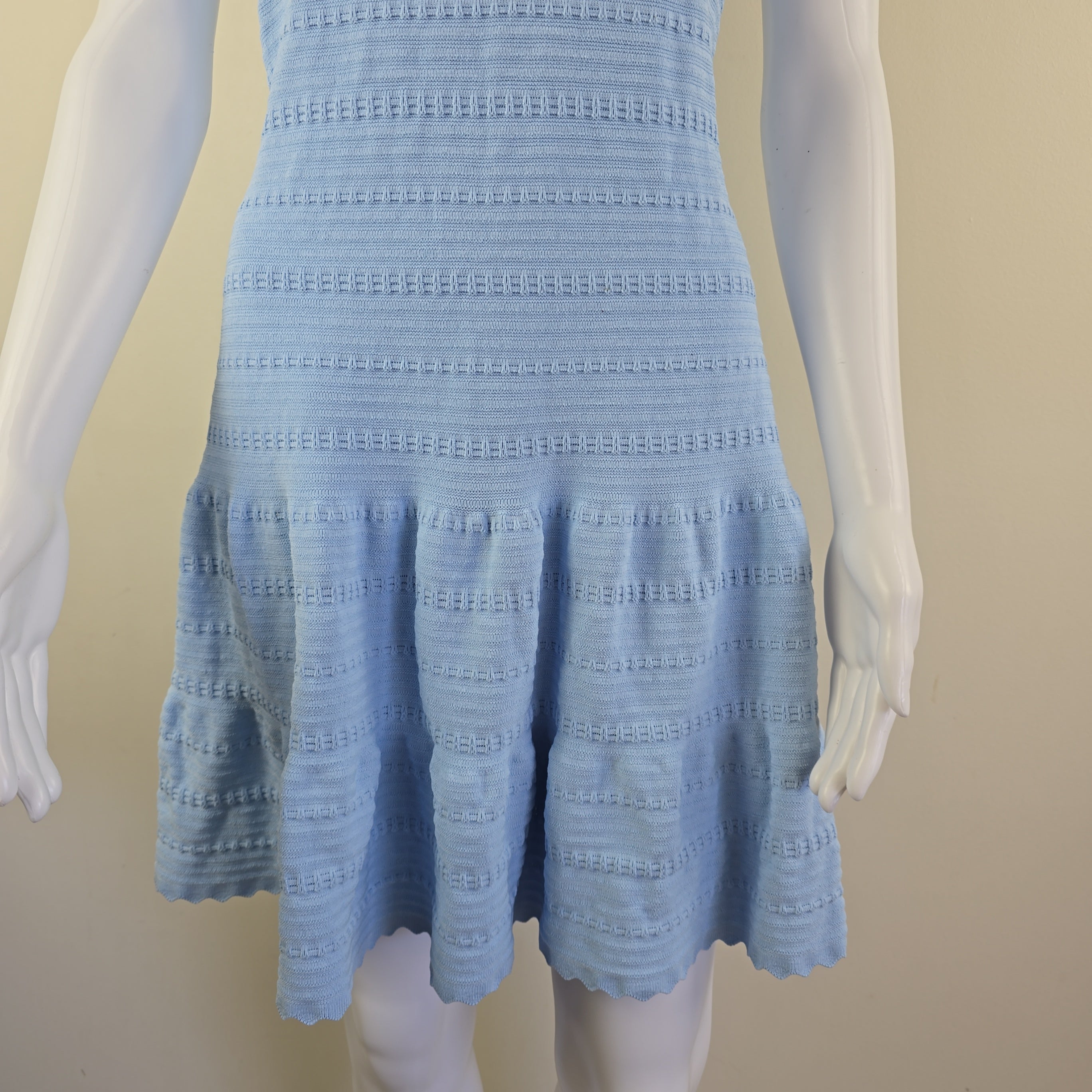 Stack of skirt on a beige background