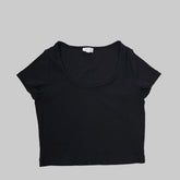 Black tank top on a tiled floor