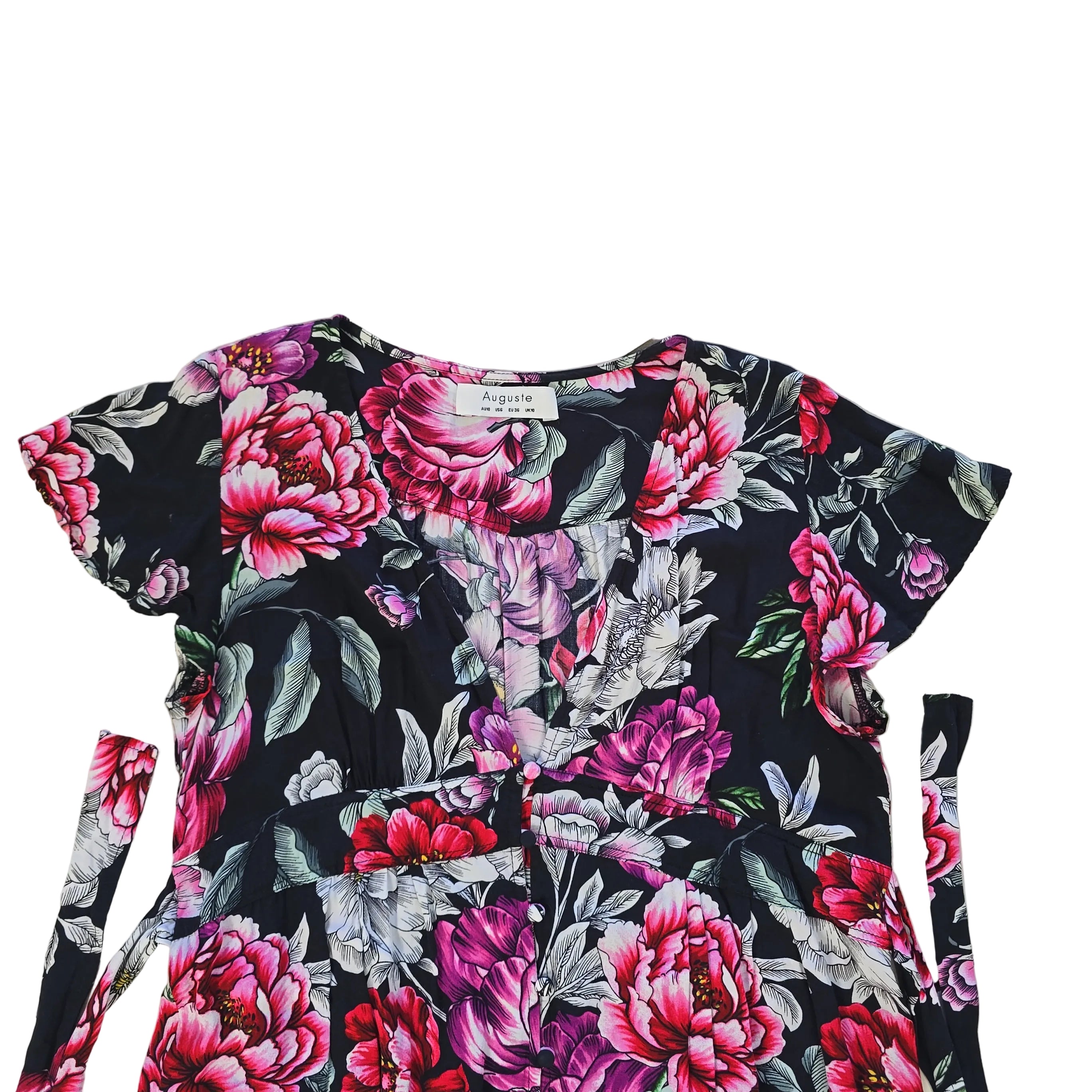 Floral-patterned mini dress on a light background