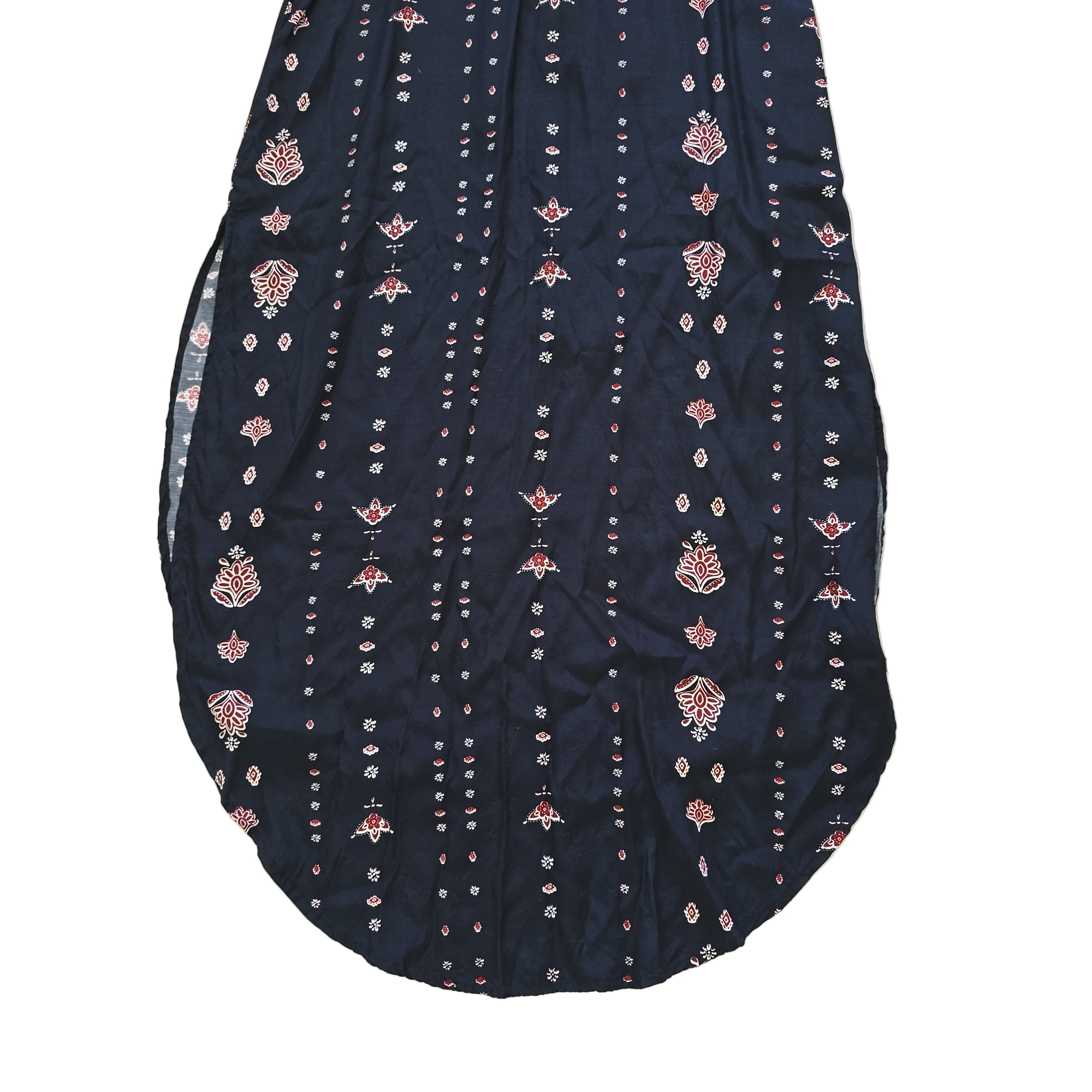 Black dress with white and pink patterns on a light background