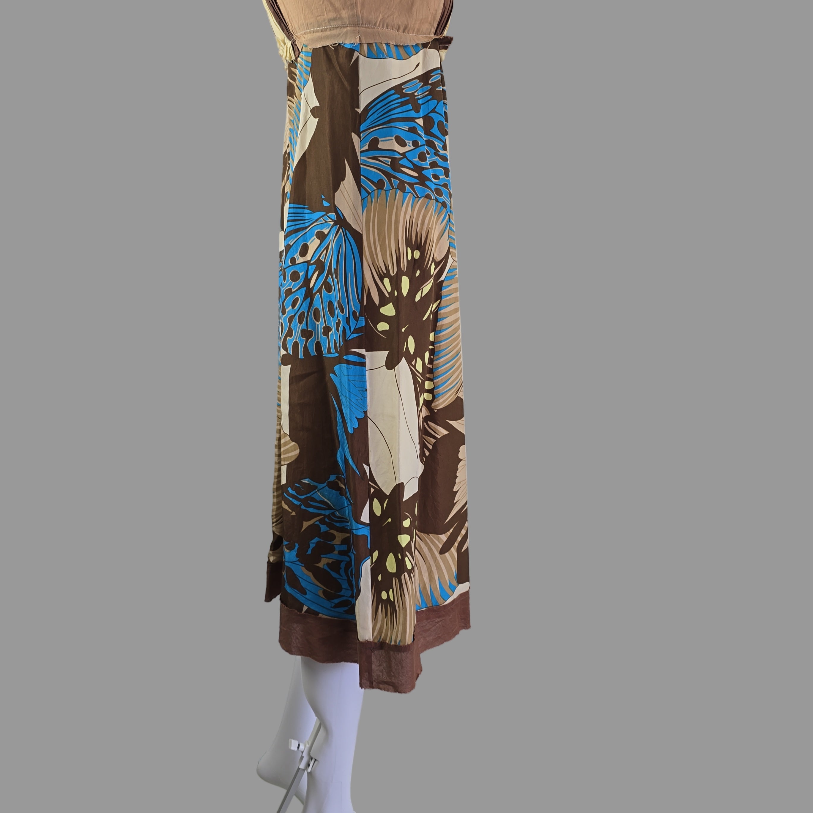 Dress with a butterfly pattern on a white surface