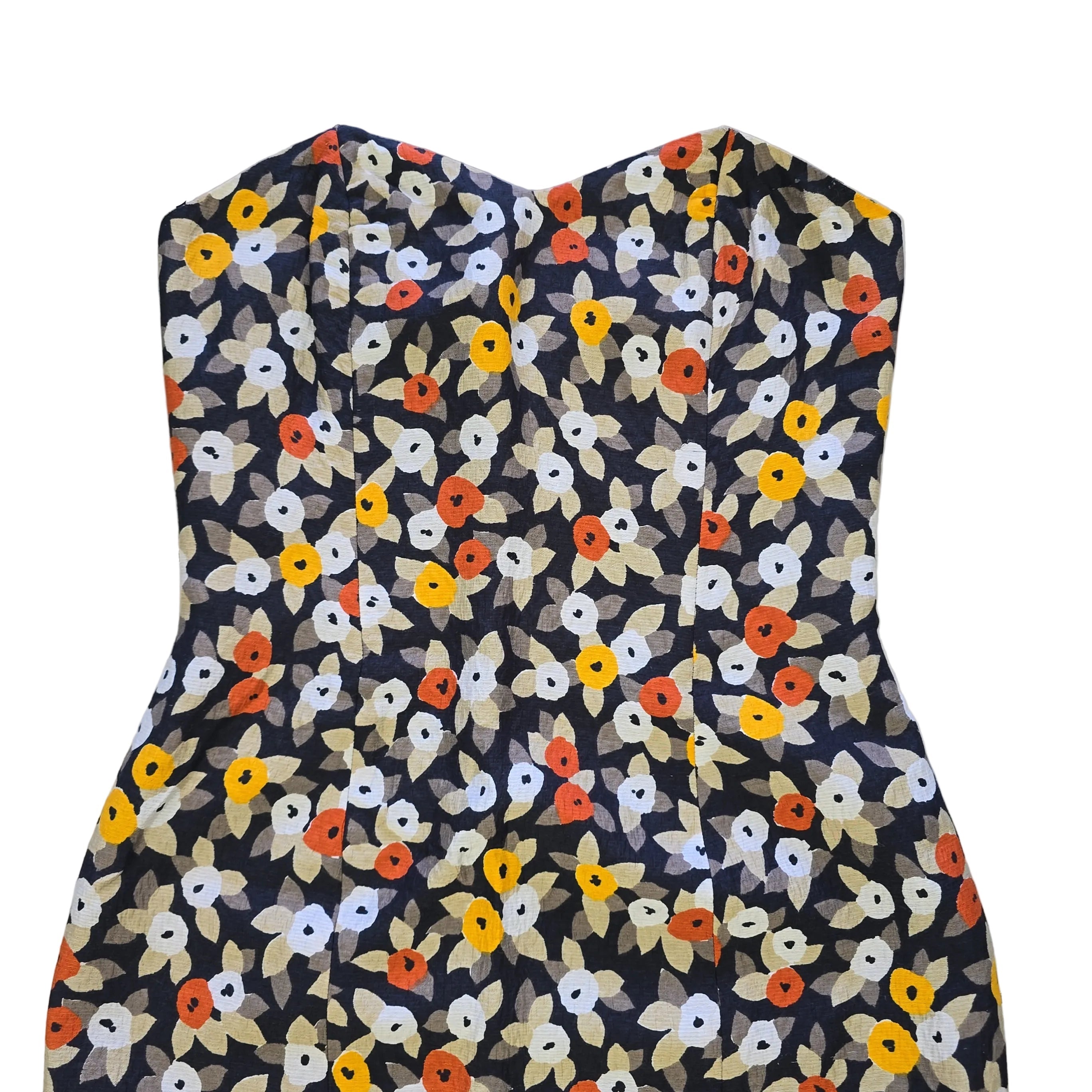 Floral-patterned strapless dress on a light background