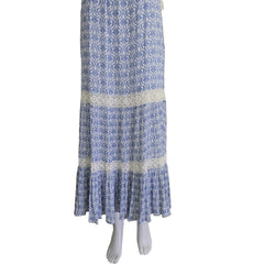 Blue and white patterned dress on a light background