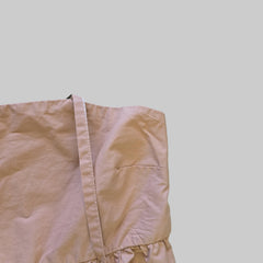 Beige fabric on a light gray background