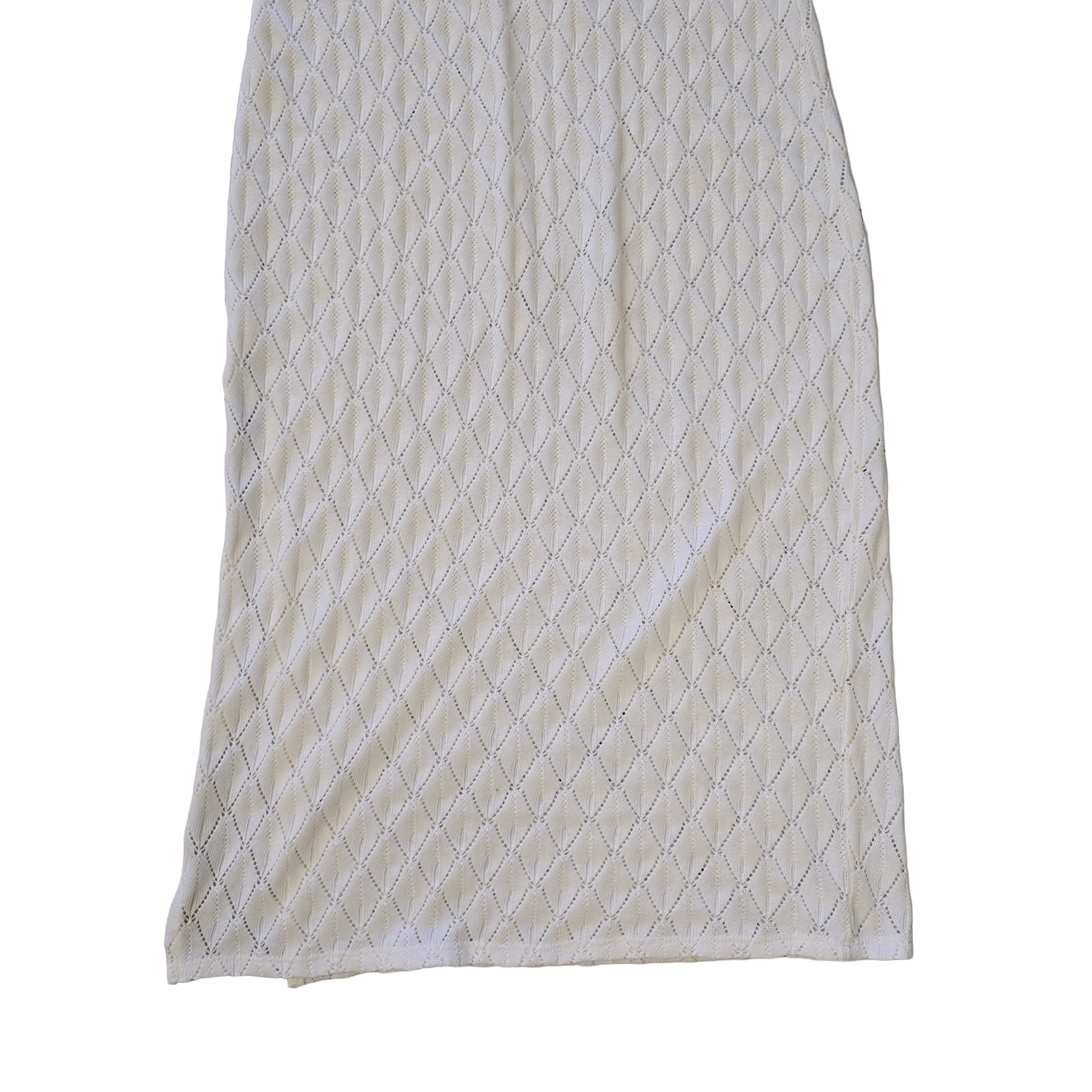 White textured dress on a light background.