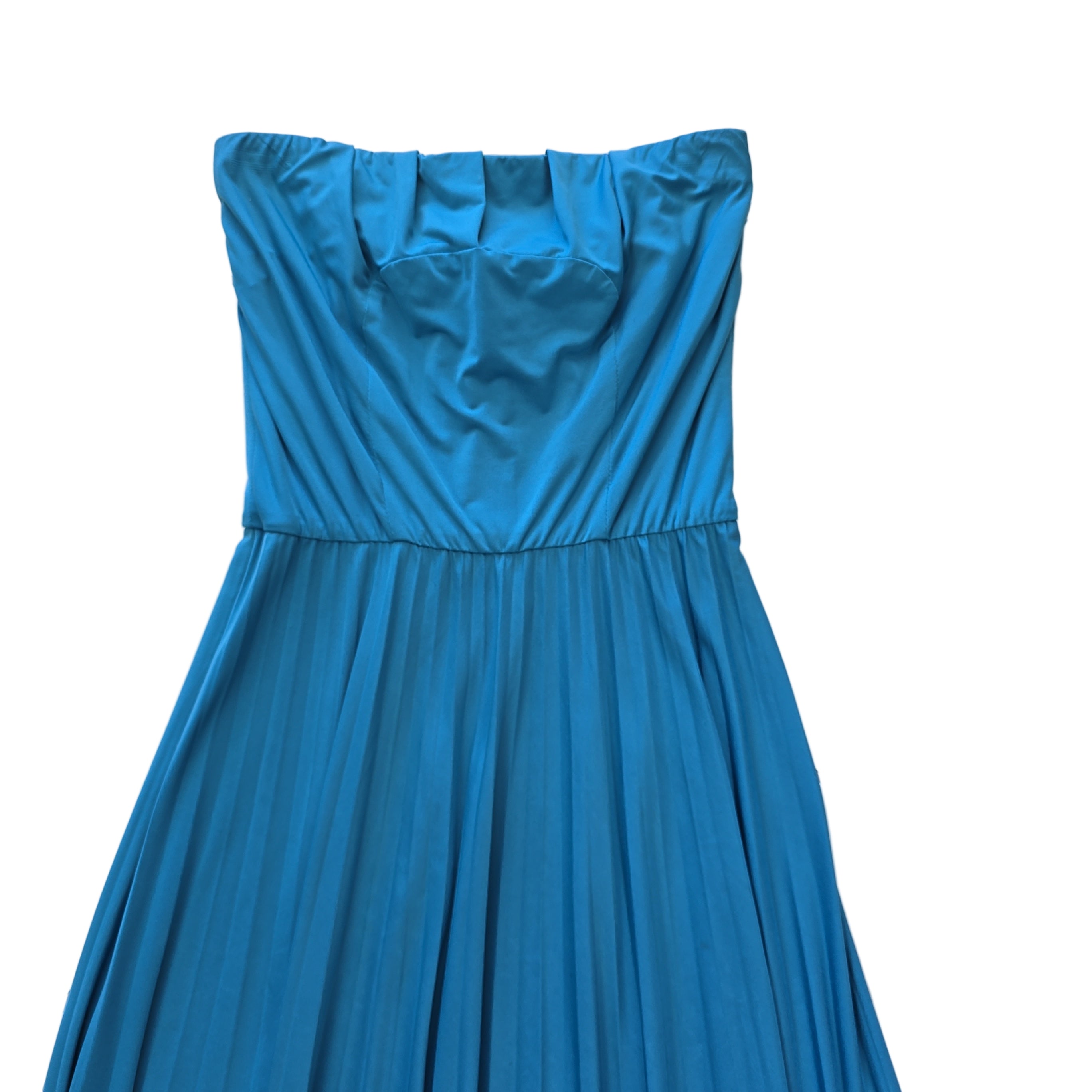 Blue strapless dress on a tiled floor