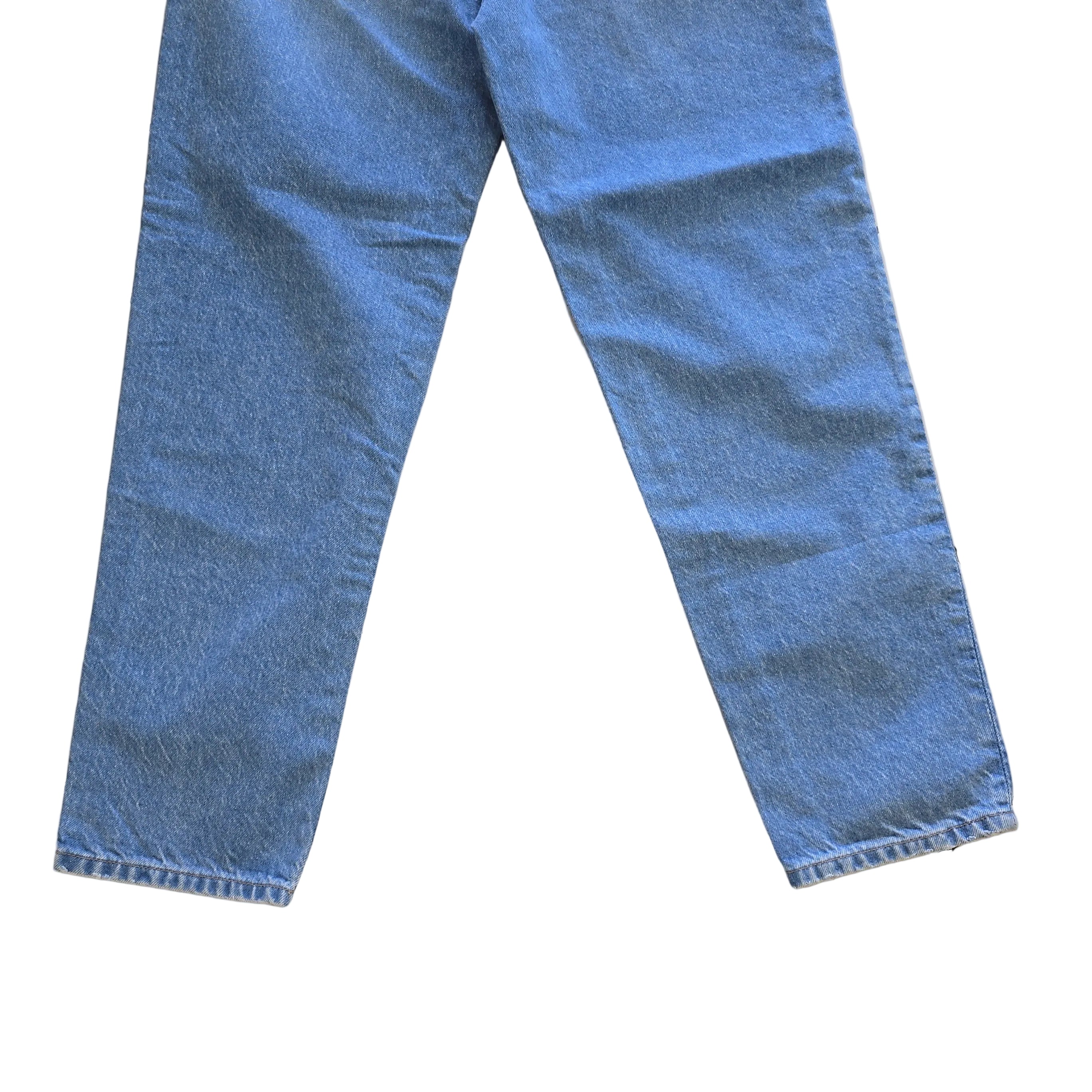 Pair of blue jeans on a light background