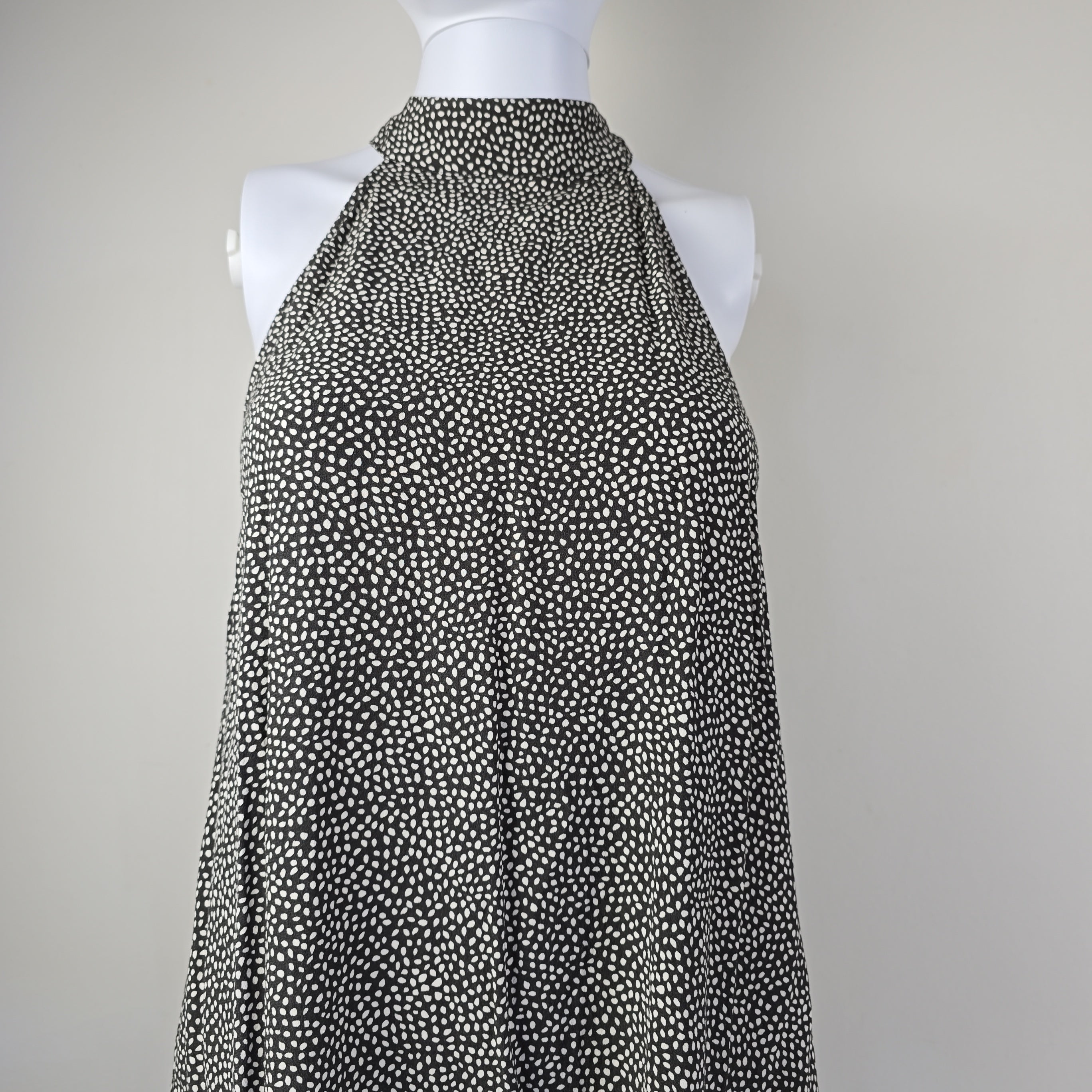 Black and white patterned fabric on a light gray background