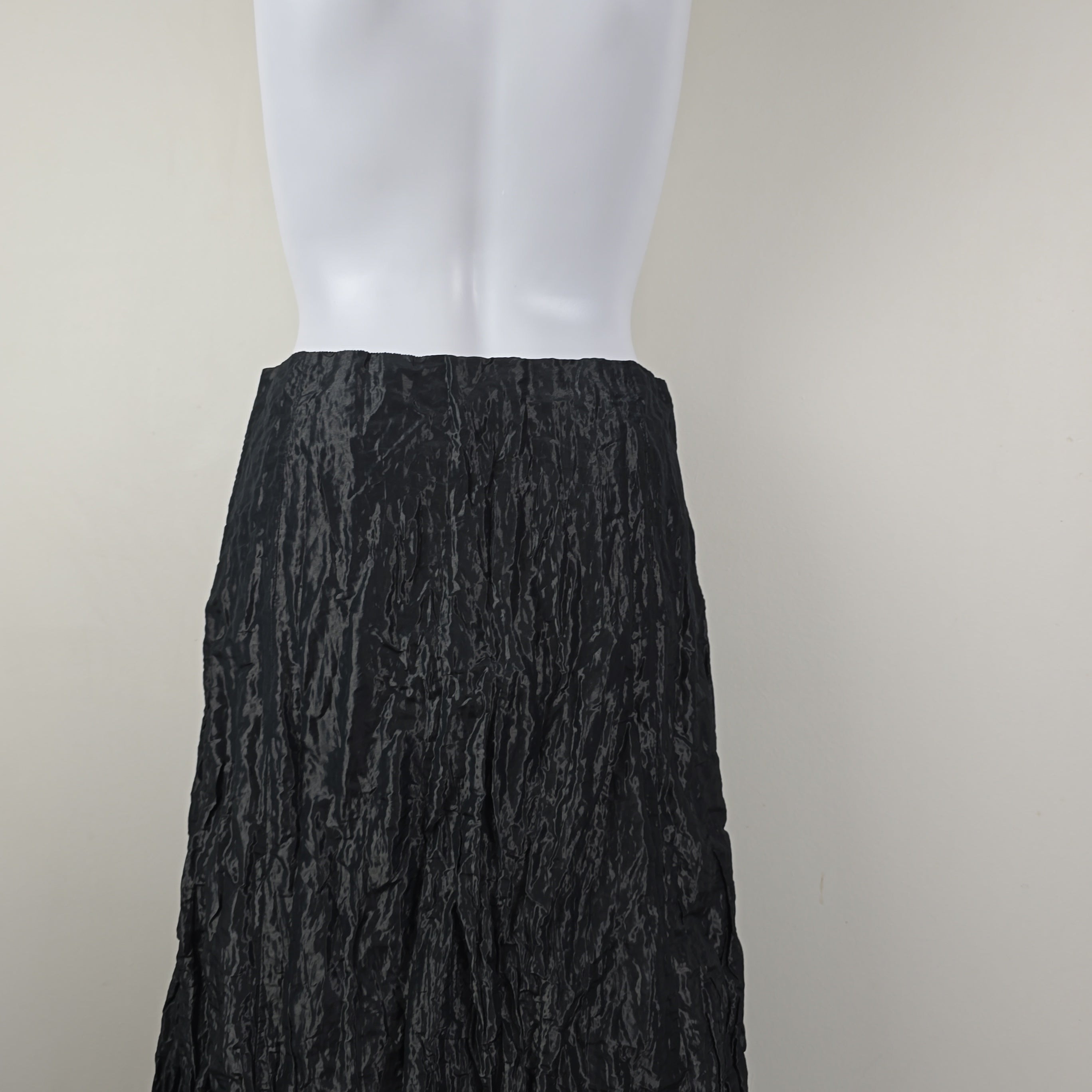 Black textured fabric on a white background