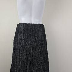 Black textured fabric on a white background