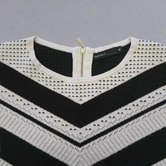 Black and white patterned tank top on a tiled floor