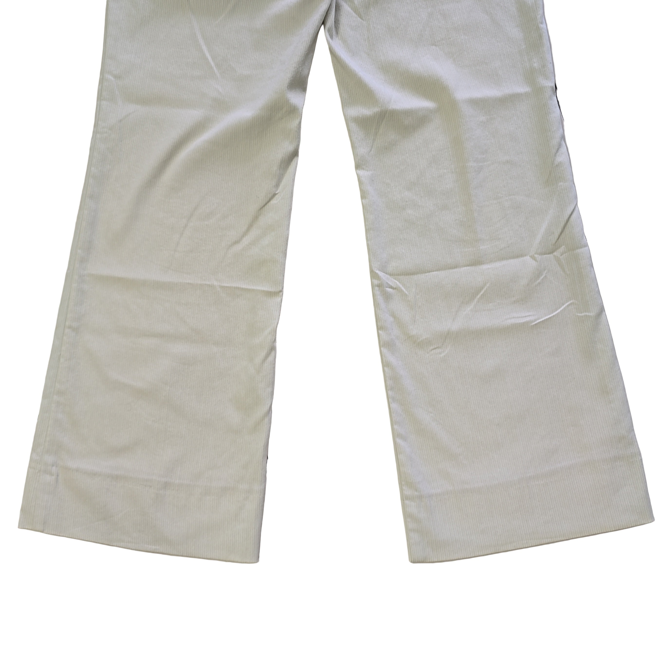 beige and white striped pants on a tiled floor