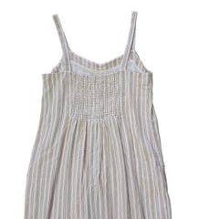 Striped dress with button details on a light background