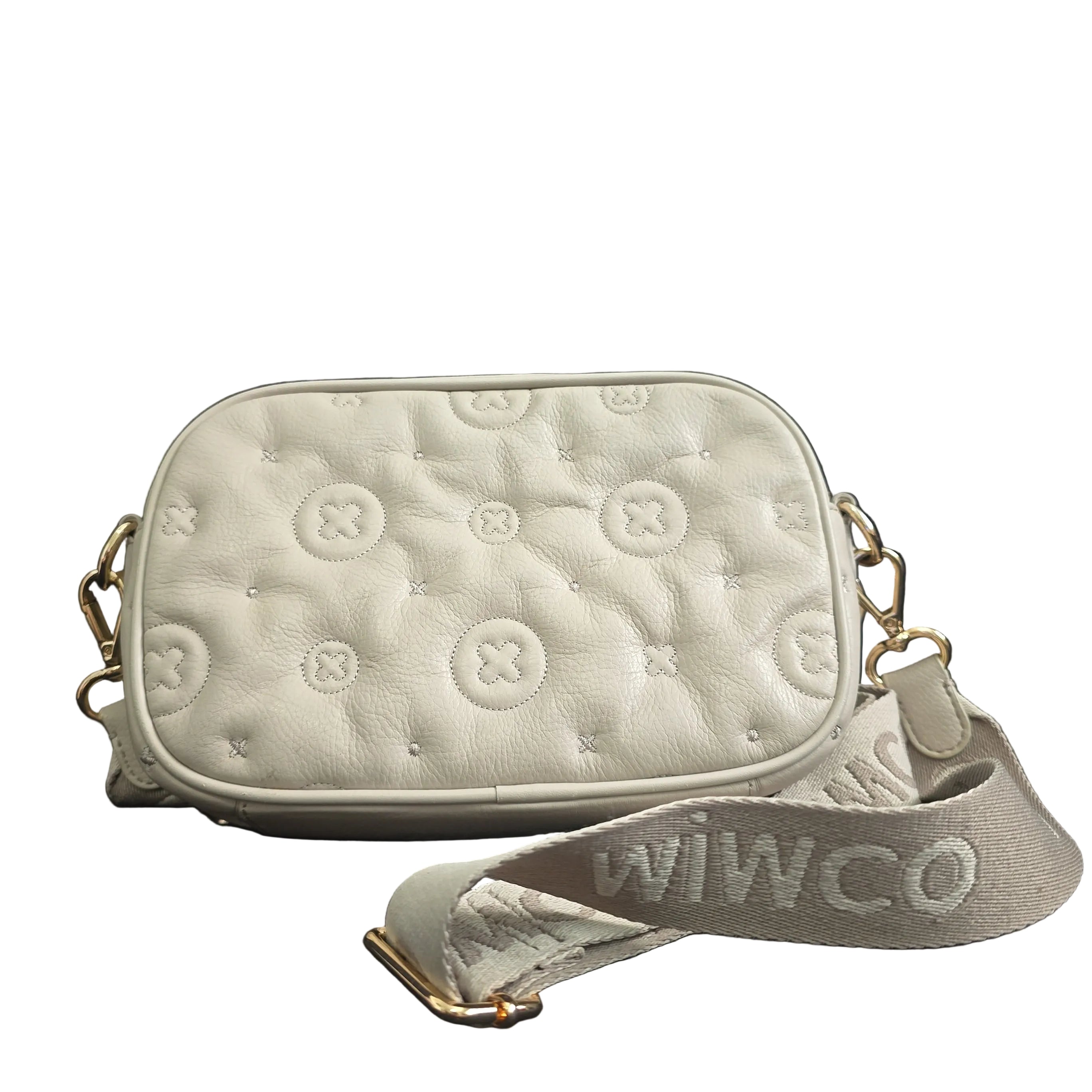 Grey shoulder bag with gold accents on a light background