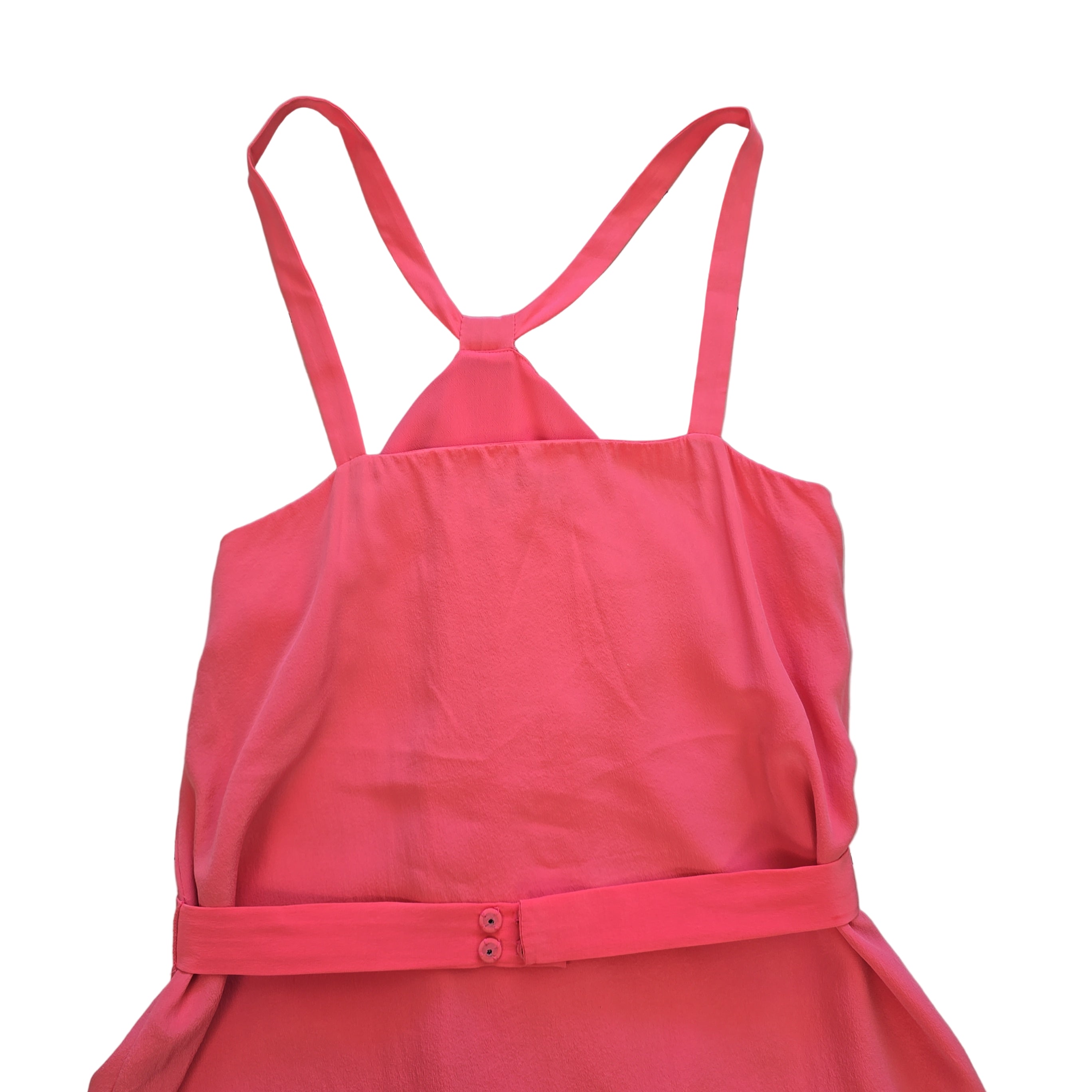 Pink dress with thin straps on a light background