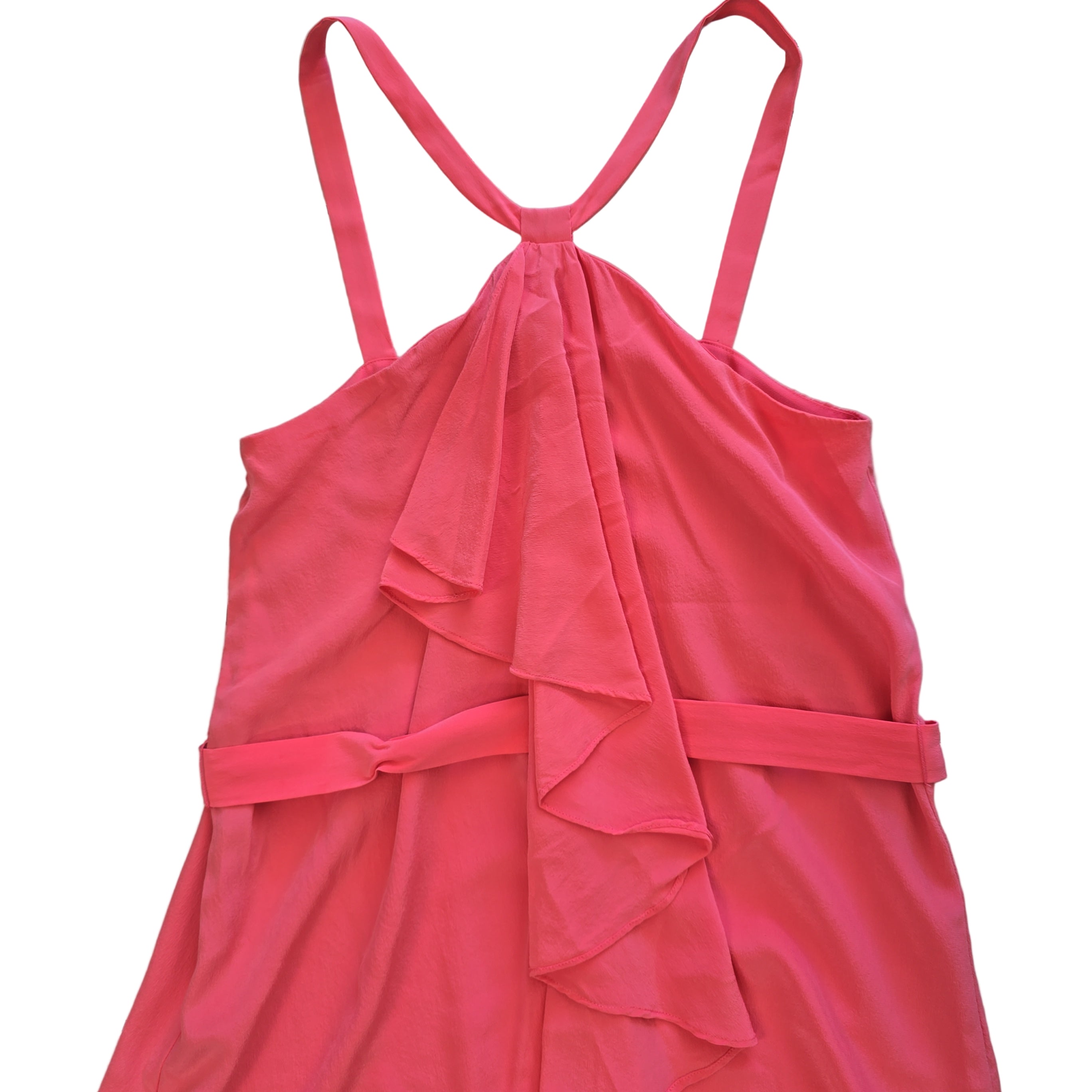 Pink dress with ruffled details on a light background