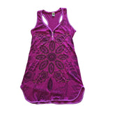Purple tank top/ mini dress with floral patterns on a light background