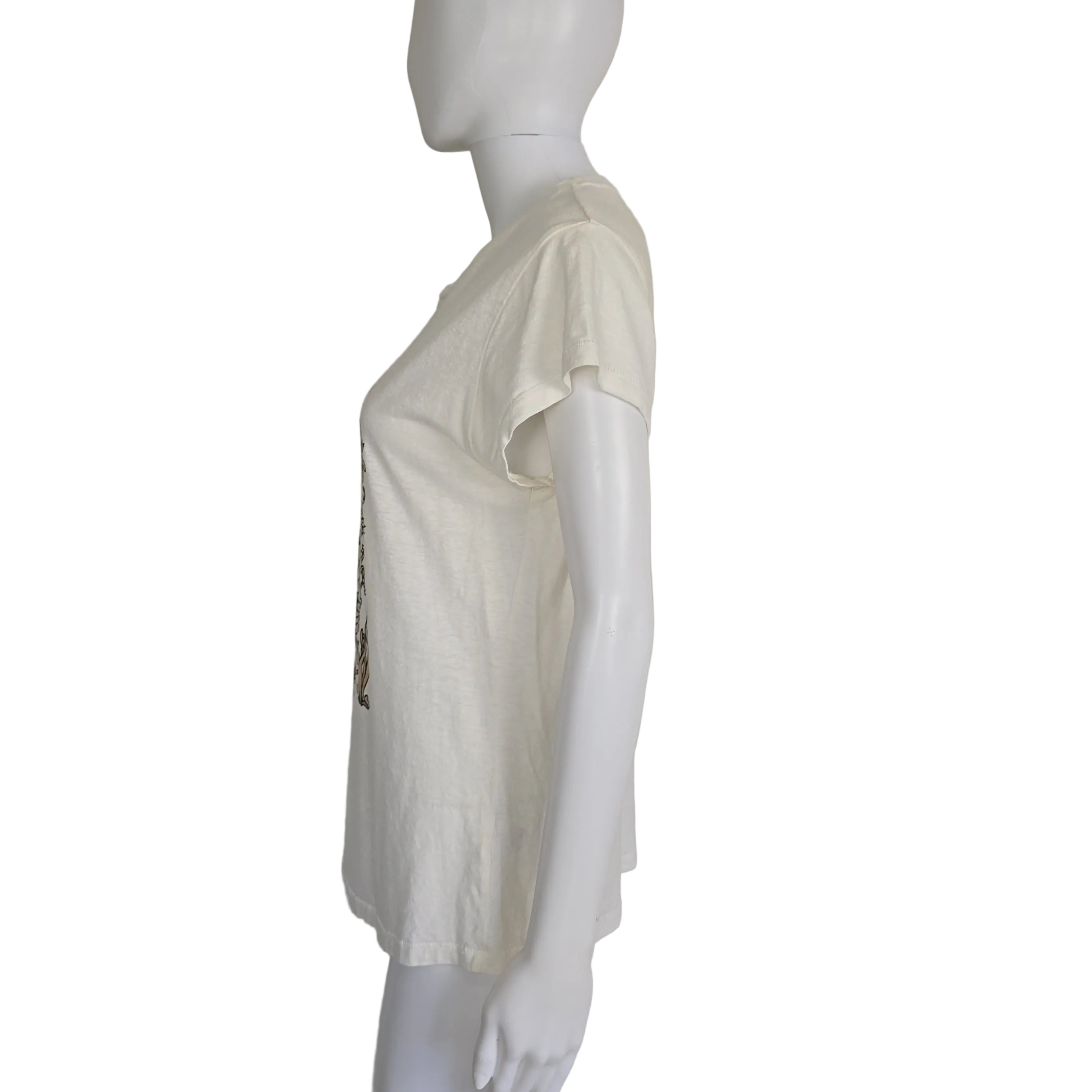 Mannequin wearing a white top with a blurred background