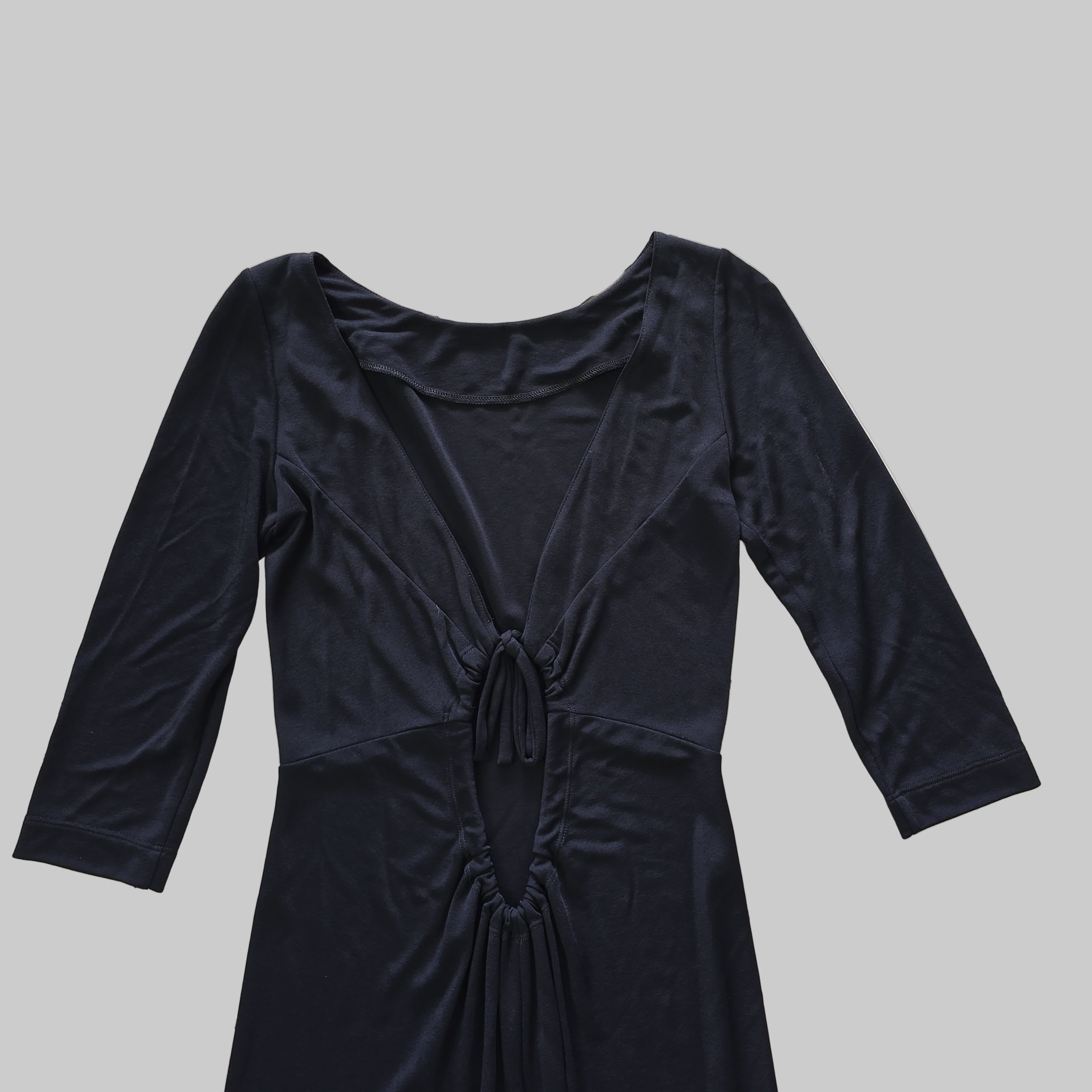 Black dress on a light background