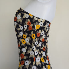 Floral-patterned strapless dress on a light background