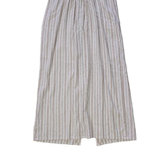 Striped dress with button details on a light background