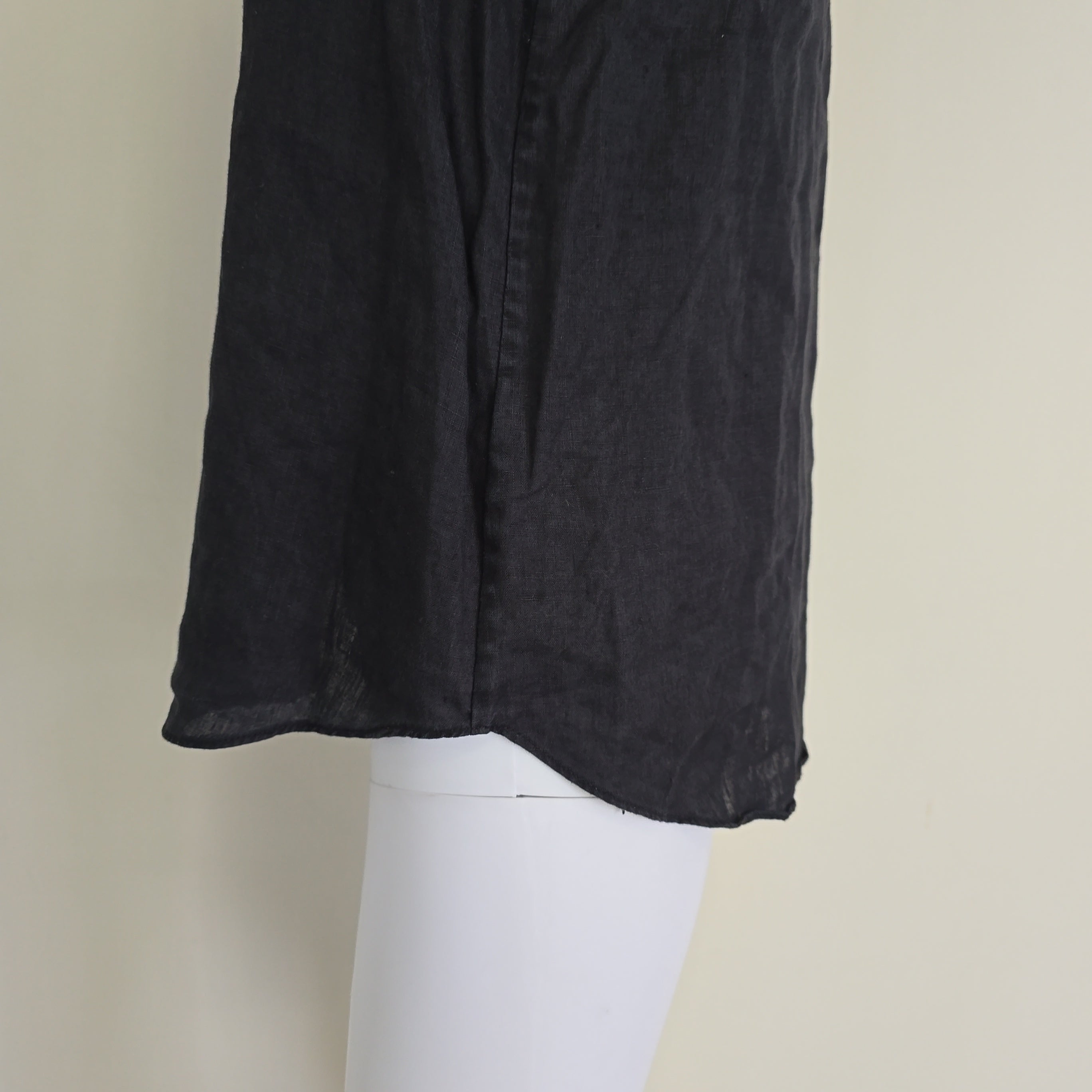Black top on a light background