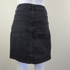 Black denim skirt on a white background