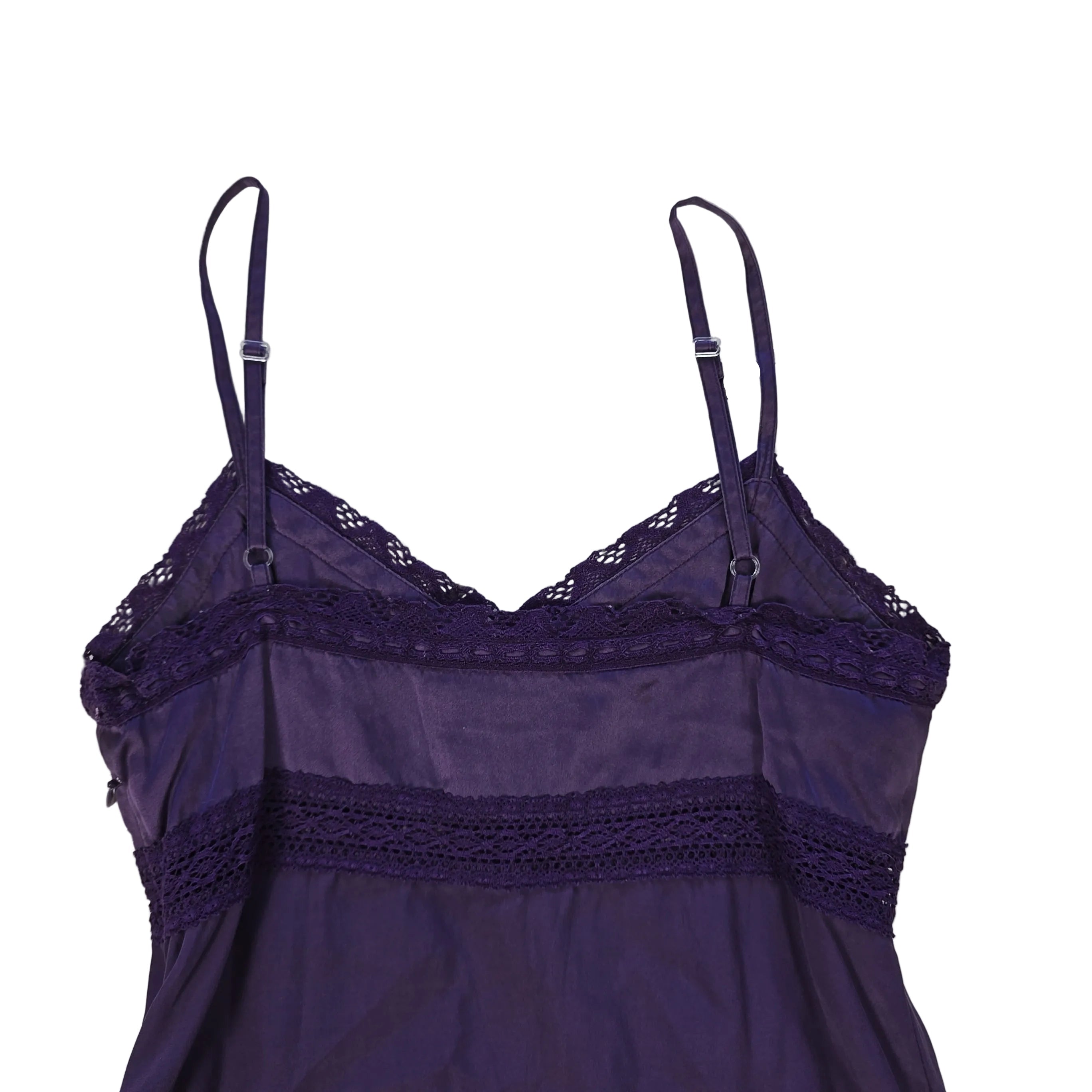 Purple lace-trimmed top on a light background