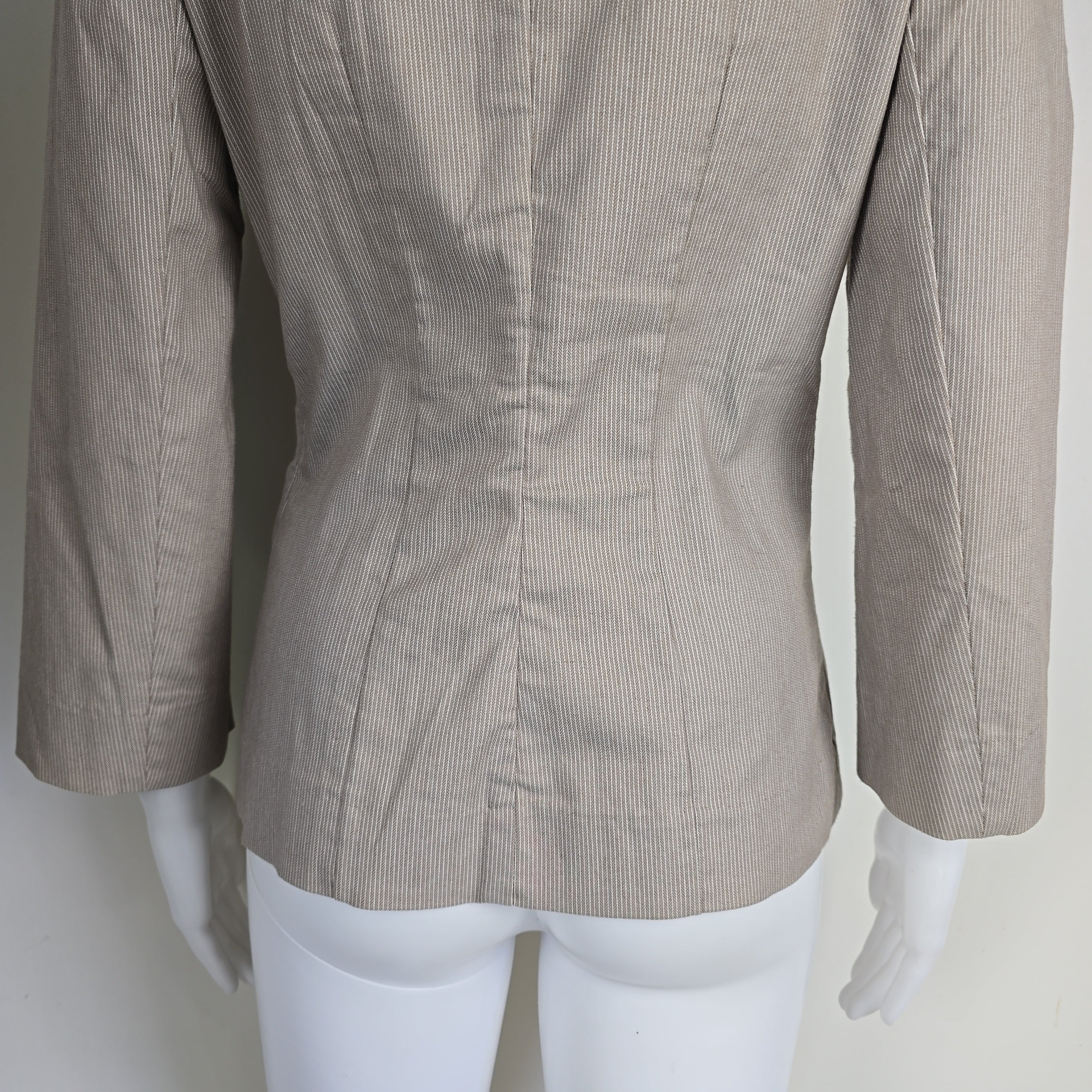 Gray pants on a mannequin against a white background