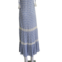 Blue and white patterned dress on a light background