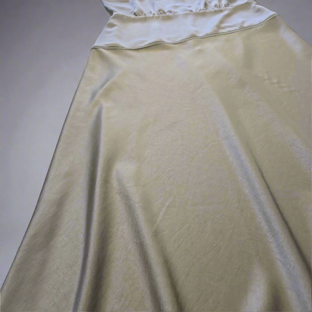 Olive fabric on a tiled floor