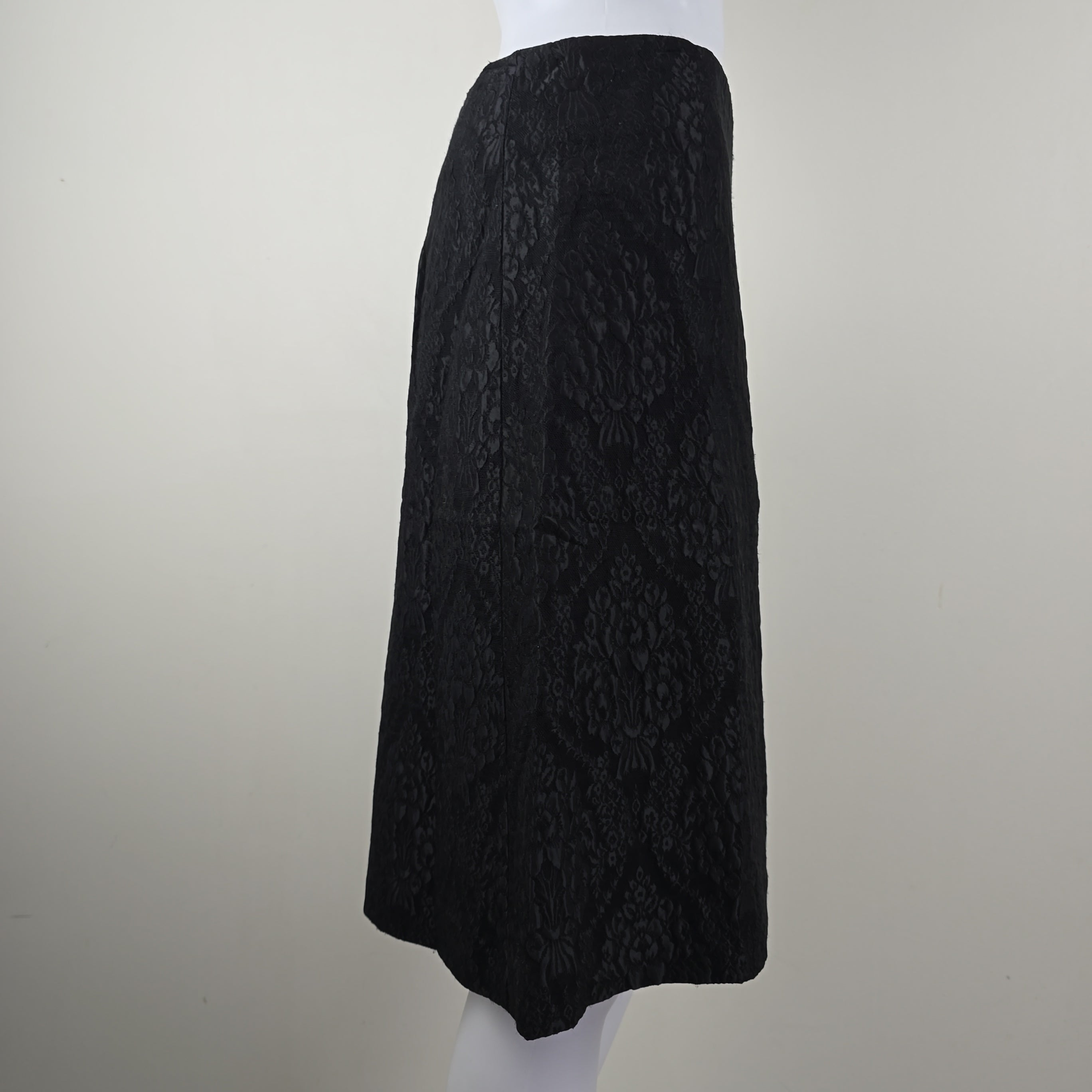 Black skirt on a white surface