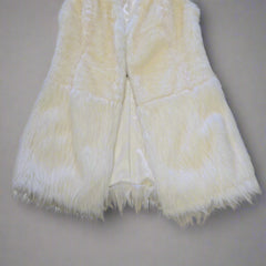 White fur coat on a tiled floor