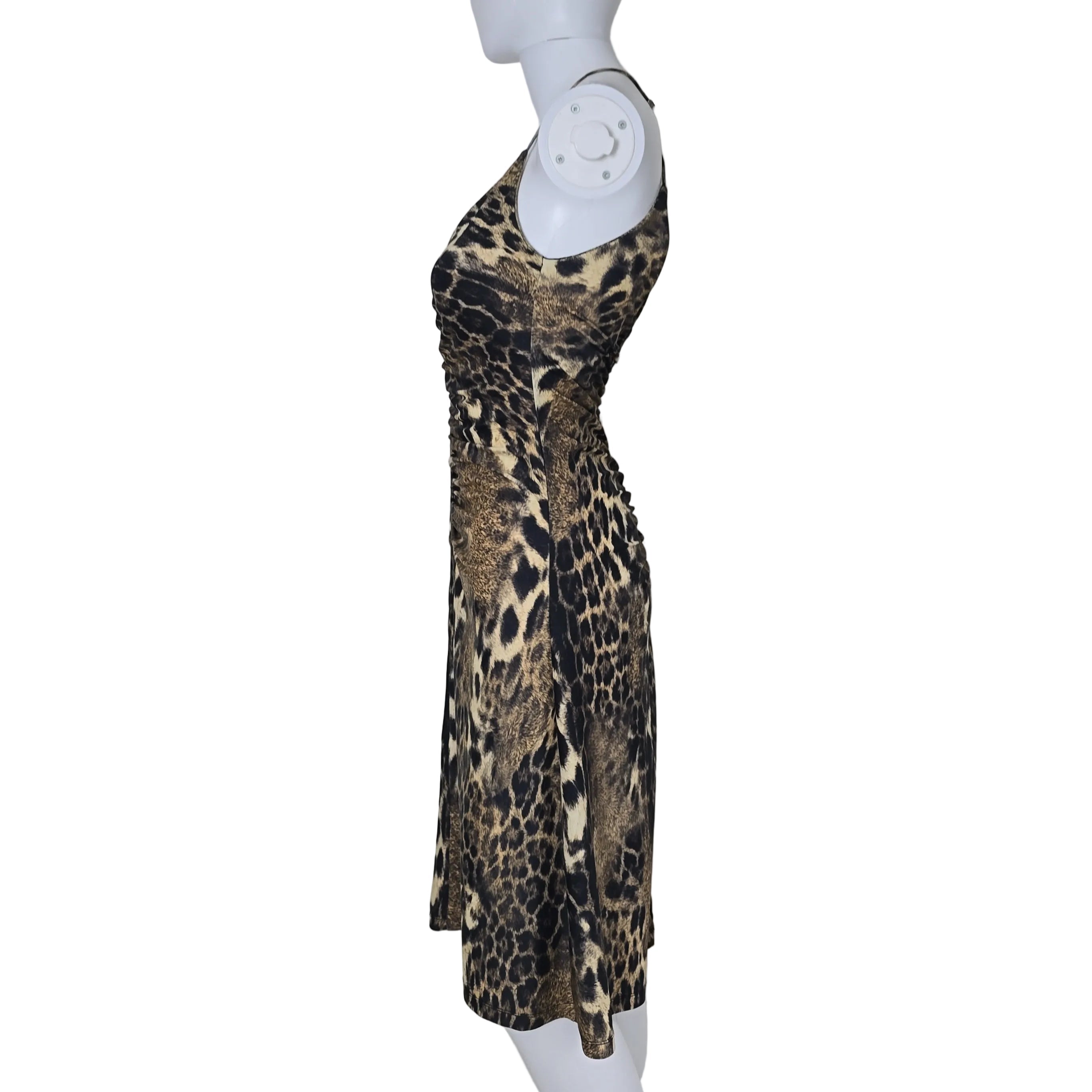 Leopard print dress on a mannequin against a plain background